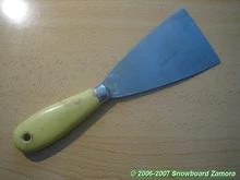 Encerar snowboard y esquis