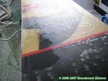 Encerar snowboard y esquis